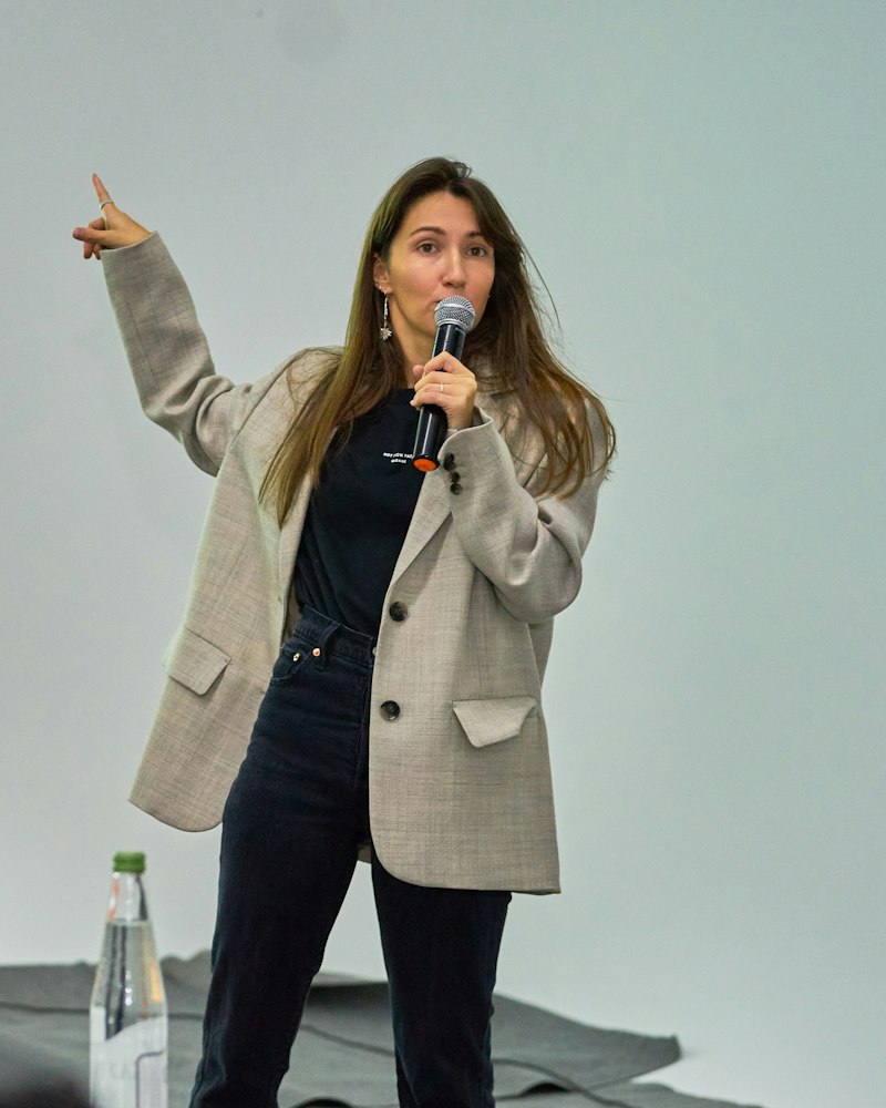 Coach giving a presentation with a microphone